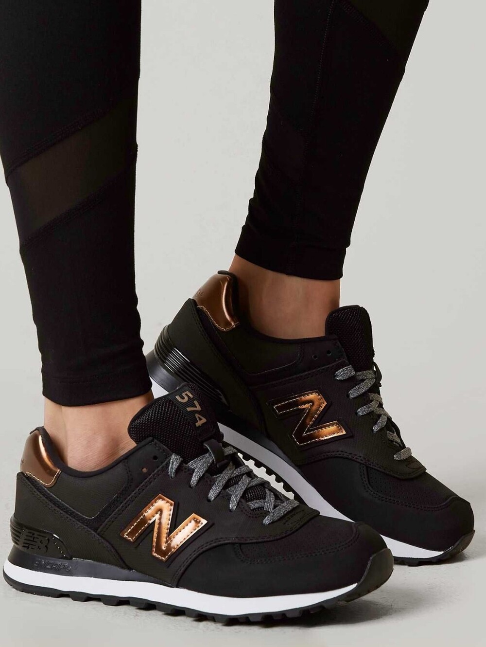 New Balance 574 Size 9.5 Women 8 Men's Black/ Metallic Bronze Sneakers